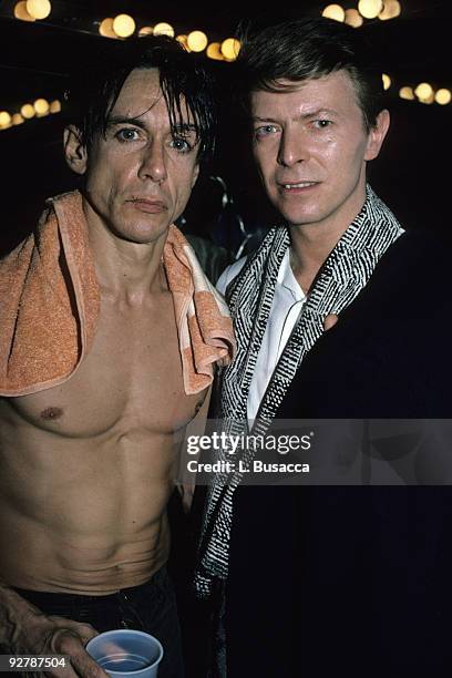 Musicians Iggy Pop and David Bowie pose backstage after Pop's concert at the Ritz, New York, New York, 1986.