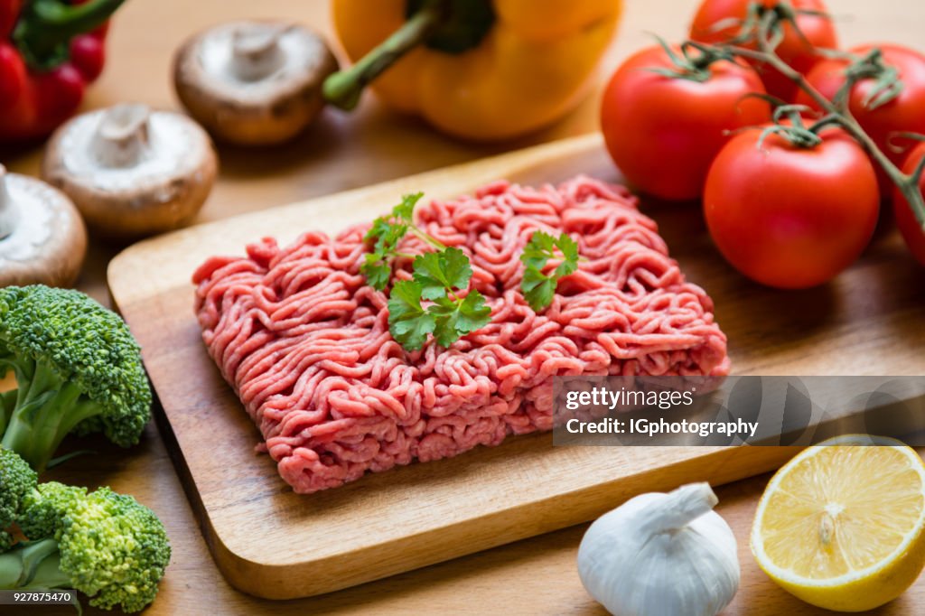 Organic Ground Beef on a Wooden Cutting-Boad