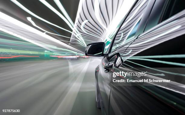 black german car drives through a modern tunnel - driverless cars foto e immagini stock