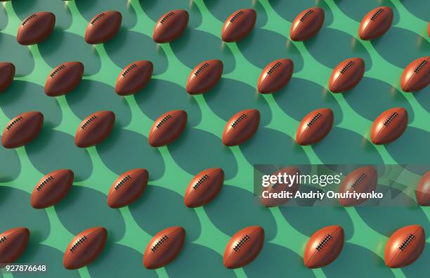 pattern of rugby balls on court - rugby ball stock-fotos und bilder