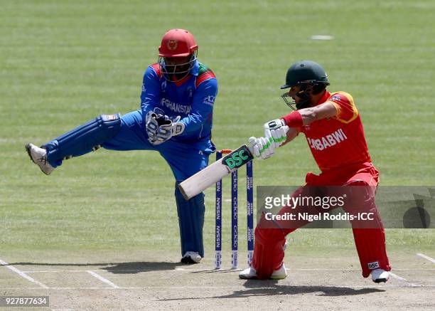 Sikandar Raza Butt of Zimbabwe plays a shot during the ICC Cricket World Cup Qualifier between Zimbabwe and Afghanistan at Queens Sorts Club on March...