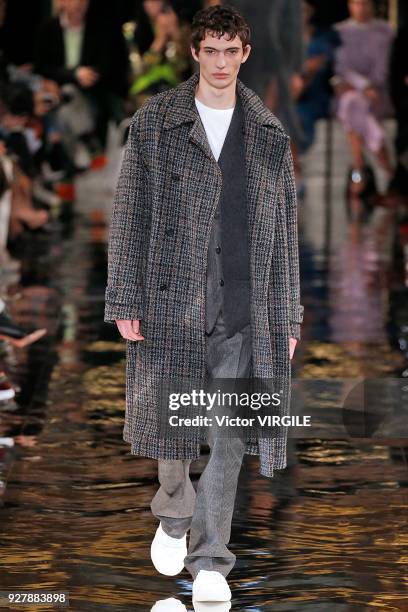 Model walks the runway during the Stella McCartney Ready to Wear Fashion show as part of the Paris Fashion Week Womenswear Fall/Winter 2018/2019 on...