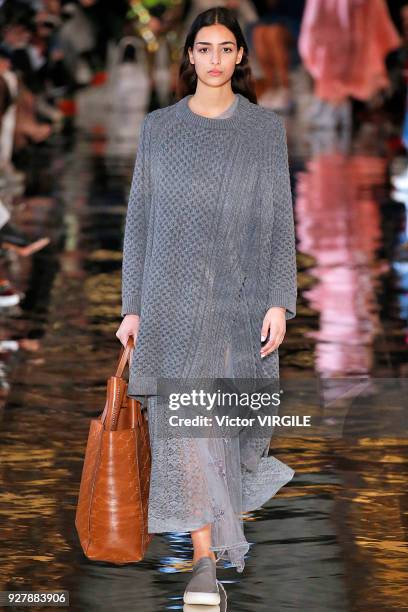 Model walks the runway during the Stella McCartney Ready to Wear Fashion show as part of the Paris Fashion Week Womenswear Fall/Winter 2018/2019 on...