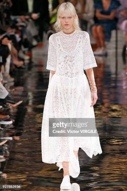 Model walks the runway during the Stella McCartney Ready to Wear Fashion show as part of the Paris Fashion Week Womenswear Fall/Winter 2018/2019 on...