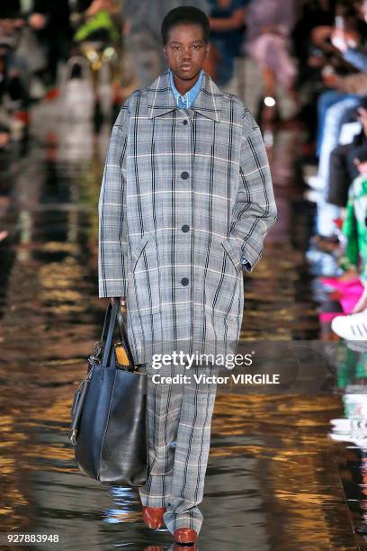 Model walks the runway during the Stella McCartney Ready to Wear Fashion show as part of the Paris Fashion Week Womenswear Fall/Winter 2018/2019 on...