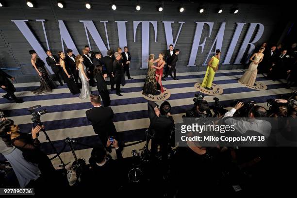 Frances McDormand and Gal Gadot embrace as they pose for pictures at the 2018 Vanity Fair Oscar Party hosted by Radhika Jones at Wallis Annenberg...