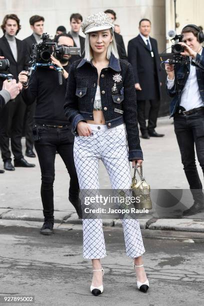 Irene Kim is seen arriving at Chanel Fashion Show during the Paris Fashion Week Womenswear Fall/Winter 2018/2019 on March 6, 2018 in Paris, France.