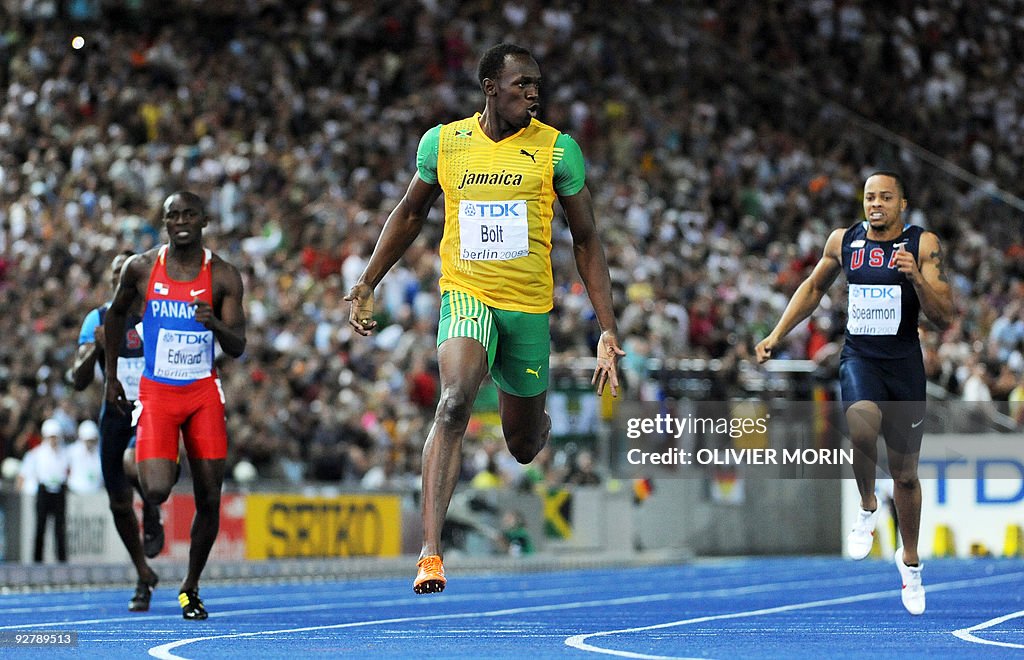 Jamaica's Usain Bolt (C) wins the men's