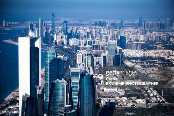 skyscrapers in abu dhabi - abu dhabi oil stock pictures, royalty-free photos & images
