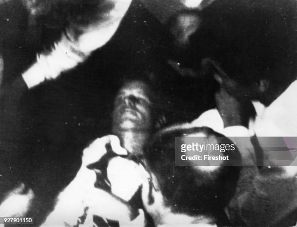 Seconds after the shooting. Senator Robert Kennedy lies badly wounded on the floor of the Ambassador Hotel. He was bleeding from the top of the head....