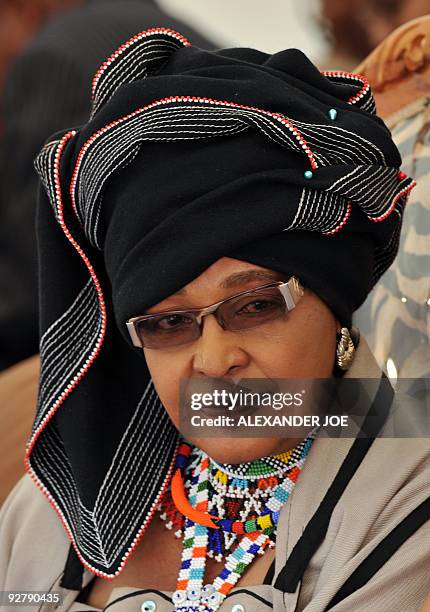 Winnie Madikizela-Mandela, former wife of Former South African President Nelson Mandela dressed in Xhosa tribe garbe attends a gathering of...