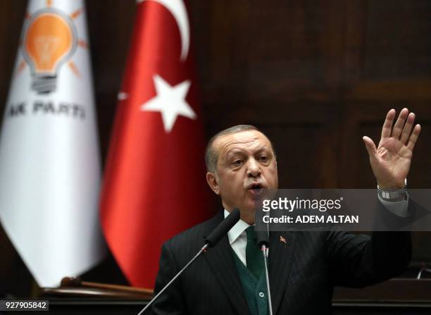 Turkish President and Leader of the Justice and Development Party Recep Tayyip Erdogan delivers a speech during the AK Party's parliamentary group...