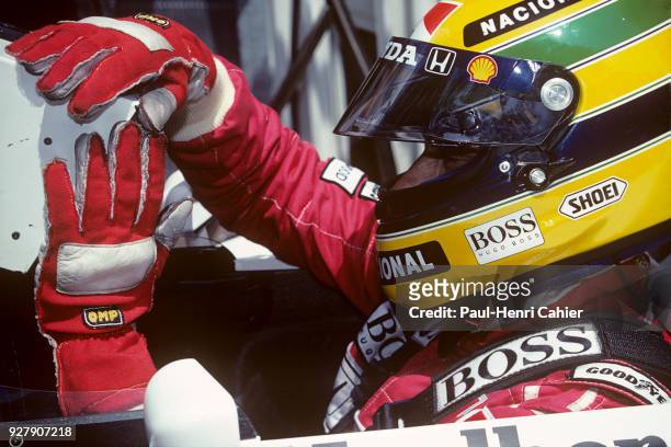 Ayrton Senna, McLaren-Honda MP4/7A, Grand Prix of France, Circuit de Nevers Magny-Cours, 05 July 1992. Ayrton Senna checking his monitor during...