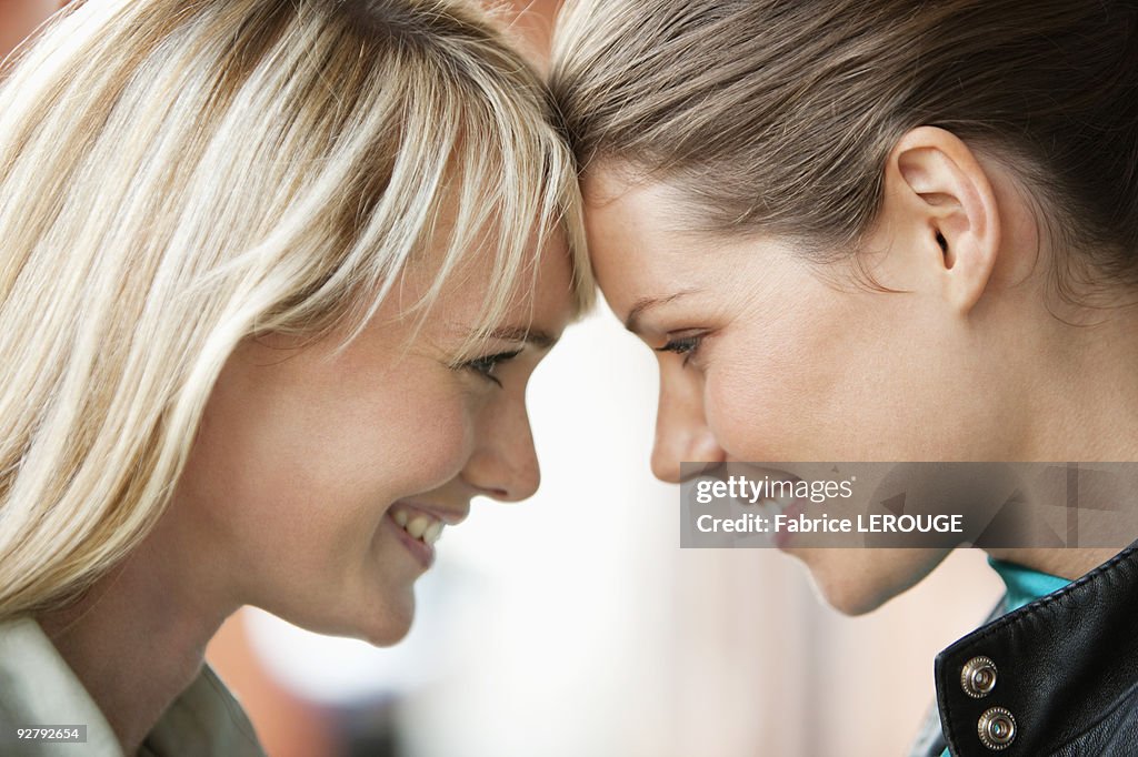 Close-up of two women smiling