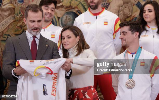 King Felipe VI of Spain, Queen Letizia of Spain and artistic skater Javier Fernandez receive the spanish Winter Olympics Team at Zarzuela palace on...