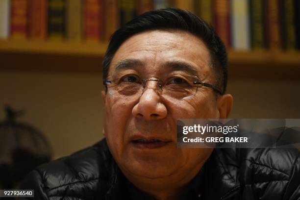 This photo taken on March 2, 2018 shows Li Datong, the former editor of the state-owned China Youth Daily newspaper, speaking during an interview in...