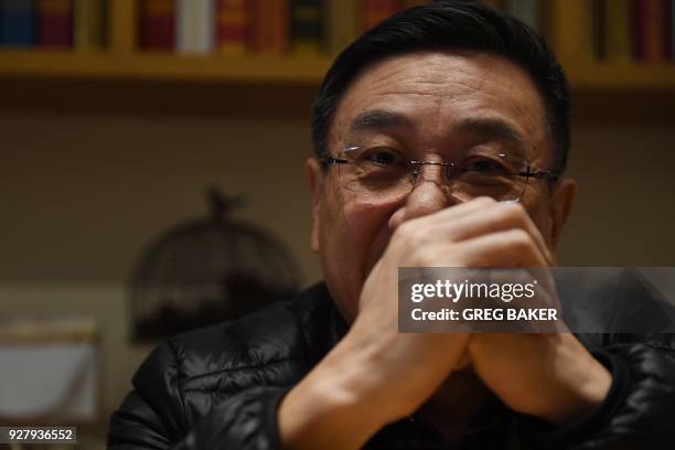 This photo taken on March 2, 2018 shows Li Datong, the former editor of the state-owned China Youth Daily newspaper, speaking during an interview in...