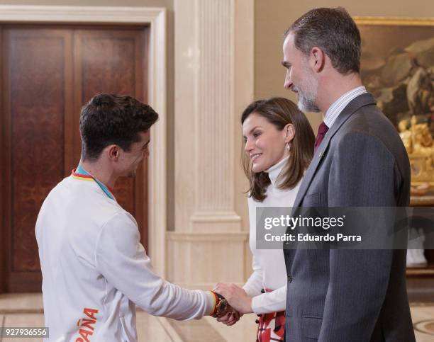 King Felipe VI of Spain, Queen Letizia of Spain and artistic skater Javier Fernandez receive the spanish Winter Olympics Team at Zarzuela palace on...