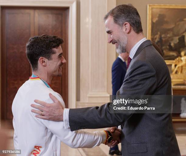 King Felipe VI of Spain, Queen Letizia of Spain and artistic skater Javier Fernandez receive the spanish Winter Olympics Team at Zarzuela palace on...