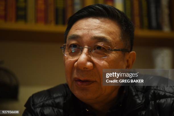 This photo taken on March 2, 2018 shows Li Datong, the former editor of the state-owned China Youth Daily newspaper, speaking during an interview in...