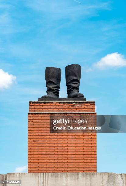 Boots Statue on Stalin's Grandstand at Memento Park in Budapest, Hungary.