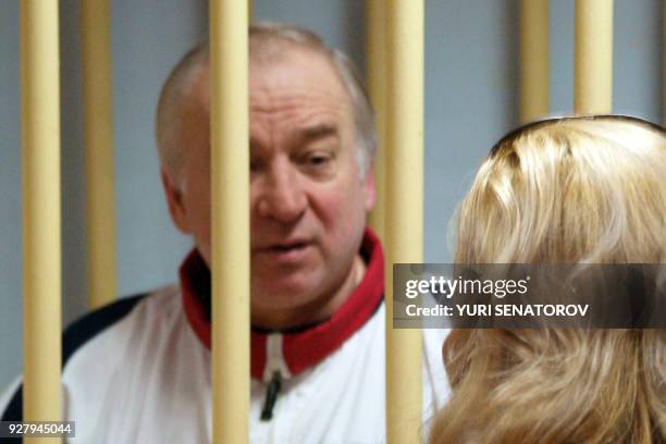 Former Russian military intelligence colonel Sergei Skripal attends a hearing at the Moscow District Military Court in Moscow on August 9, 2006. -...