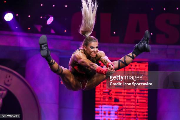 Regiane Da Silva competes in Fitness International as part of the Arnold Sports Festival on March 2 at the Greater Columbus Convention Center in...