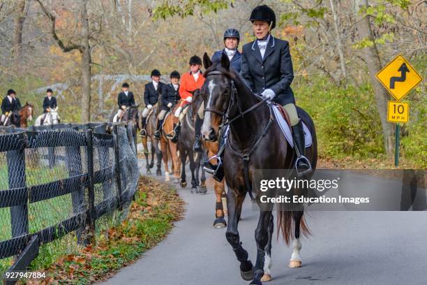 Huntsmen at the Annual Blessing of the Hounds at the Iroquois Hunt Club in Kentucky .