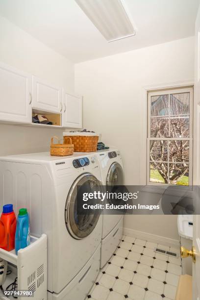 Laundry room interior of middle-class American home in Kentucky.