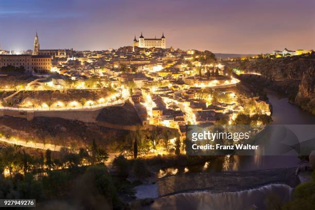 view of the river tajo with cathedral santa maria and alcazar, toledo, castile-la mancha, spain - toledo cathedral stock pictures, royalty-free photos & images