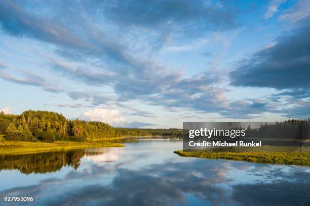 little lake at sunset, north shore of prince edward island, canada - edward koh stockfoto's en -beelden