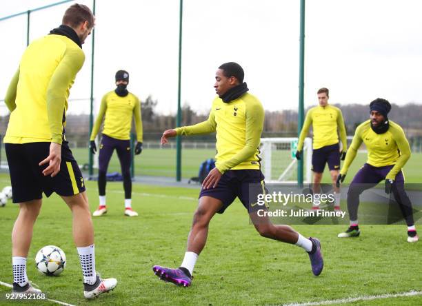 Kyle Walker-Peters performs a drill with team mates during a Tottenham Hotspur training session on the eve of their UEFA Champions League match...