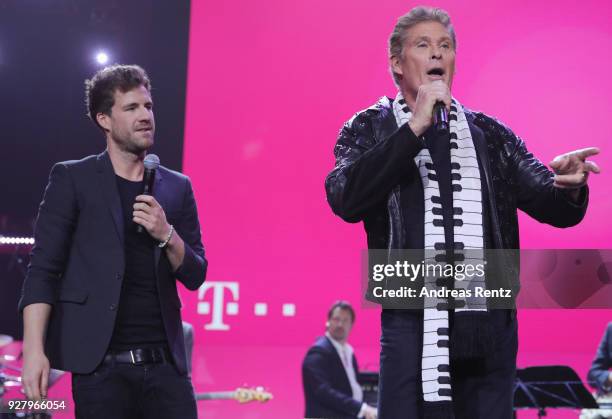 Luke Mockridge and David Hasselhoff perform on stage during the Deutsche Telekom presentation on March 6, 2018 in Bonn, Germany. Deutsche Telekom...