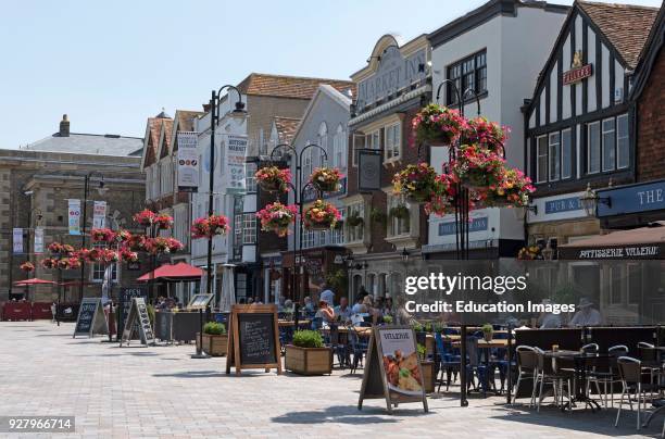 Pubs and restaurants on the Market Place in the historic city of Salisbury Wiltshire England UK.