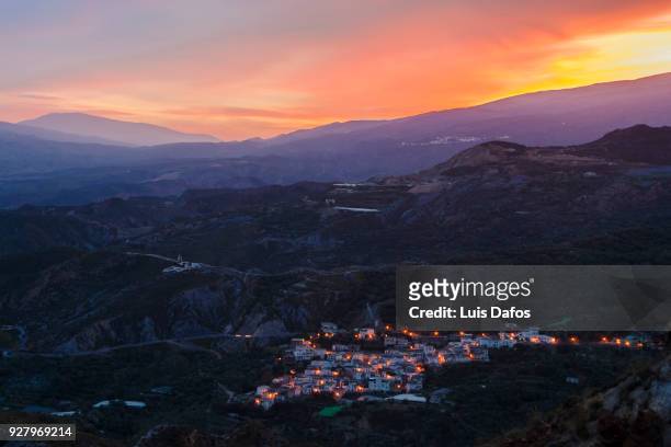 landscape at sunset with las alpujarras village of picena - alpujarra fotografías e imágenes de stock