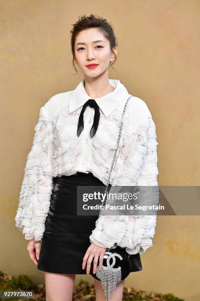 Maggie Jiang attends the Chanel show as part of the Paris Fashion Week Womenswear Fall/Winter 2018/2019 at Le Grand Palais on March 6, 2018 in Paris,...