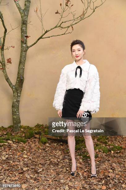 Maggie Jiang attends the Chanel show as part of the Paris Fashion Week Womenswear Fall/Winter 2018/2019 at Le Grand Palais on March 6, 2018 in Paris,...