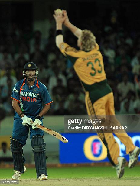 Australian cricketer Shane Watson catches out Indian cricketer Yuvraj Singh, during the fifth One-Day International between India and Australia at...