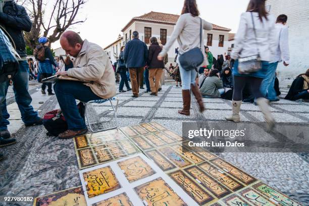 arabic script souvenirs in the albaicin - albaicín stock pictures, royalty-free photos & images