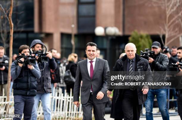 Prime Minister Zoran Zaev leaves Skopje court on March 6, 2018 on the first day of his trial to answer the charge of requesting bribe from a local...