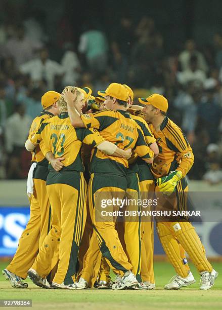 Australia cricketers celebrate their win, during the fifth One-Day International between India and Australia at the Rajiv Gandhi International...