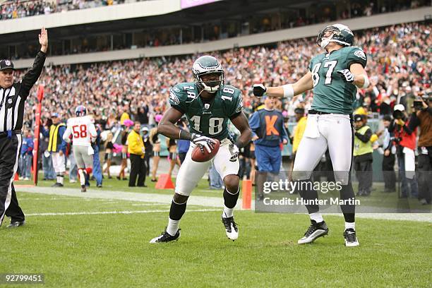 Wide receiver Jeremy Maclin of the Philadelphia Eagles celebrates his touchdown with tight end Brent Celek during a game against the New York Giants...