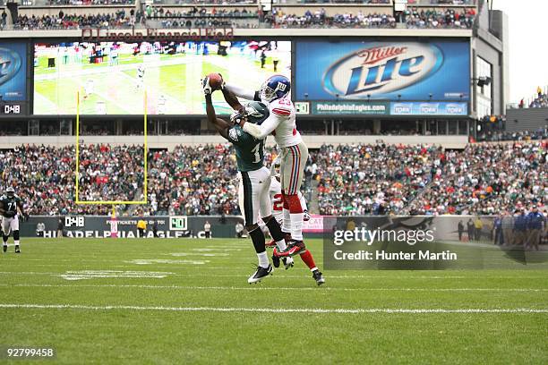 Wide receiver Jeremy Maclin of the Philadelphia Eagles catches a touchdown pass over cornerback Corey Webster of the New York Giants during a game on...