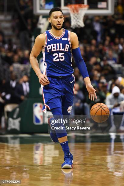 Ben Simmons of the Philadelphia 76ers handles the ball during a game against the Milwaukee Bucks at the Bradley Center on March 4, 2018 in Milwaukee,...