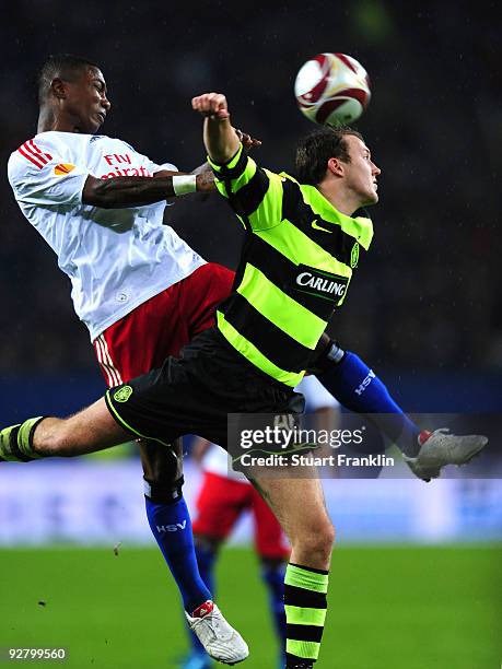 Eljero Elia of Hamburg challenges Lee Naylor of Celtic during the UEFA Europa League game between Hamburger Sv and Glasgow Celtic on November 5, 2009...