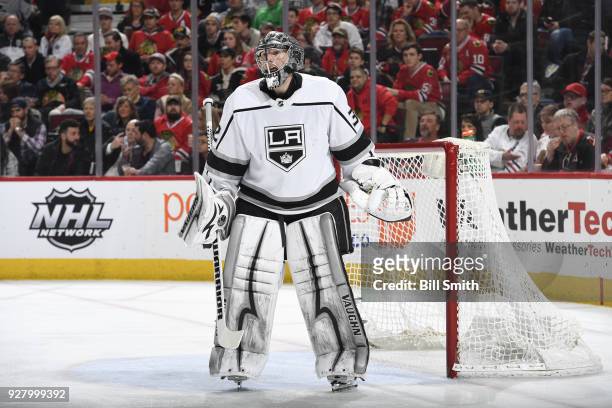 Goalie Jonathan Quick of the Los Angeles Kings guards the net in the first period against the Chicago Blackhawks at the United Center on February 19,...