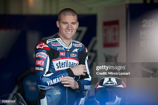 Ben Spies of USA and Yamaha Factory Racing smiles in box during the last round of Comunitat Valenciana Grand Prix MotoGP in the Valencia Circuit on...