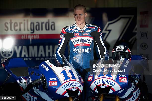 Ben Spies of USA and Yamaha Factory Racing poses with his new bike in box during the last round of Comunitat Valenciana Grand Prix MotoGP in the...