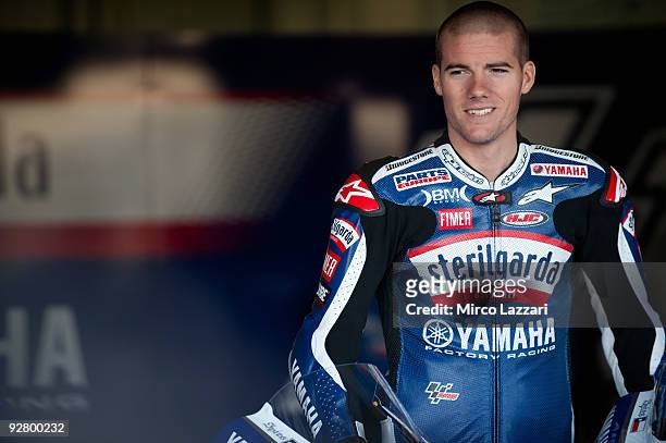 Ben Spies of USA and Yamaha Factory Racing smiles in box during the last round of Comunitat Valenciana Grand Prix MotoGP in the Valencia Circuit on...