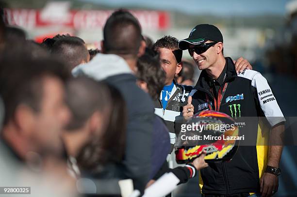 Colin Edwards of USA and Monster Yamaha Tech 3 poses for fans during the event "Riders for Health" of last round of Comunitat Valenciana Grand Prix...